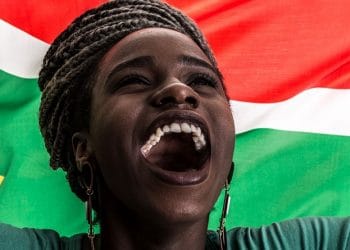 womends day August 2020 - womans face with the SA falg behind her