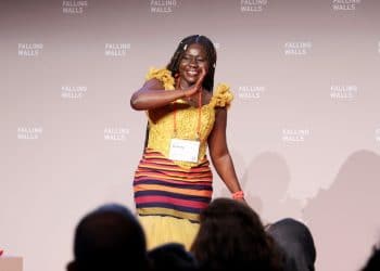 African female scientists wear various hats