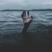 Reach out this World Suicide Prevention Day 22 hand reaching out of water for help